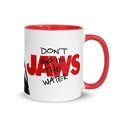 Jaws two-tone ceramic coffee mug featuring the classic Jaws logo on the front against a white body with a contrasting colored rim and handle