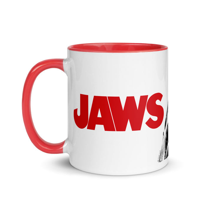 Close-up view of the Jaws logo mug showing the colored interior and handle details