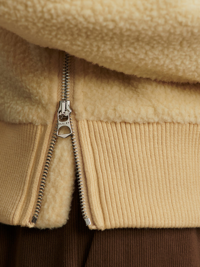 Reed Yellow|Front view of Varley Jaylin Half Zip Fleece Reed Yellow, a soft fleece with half-zip neckline and long sleeves.
