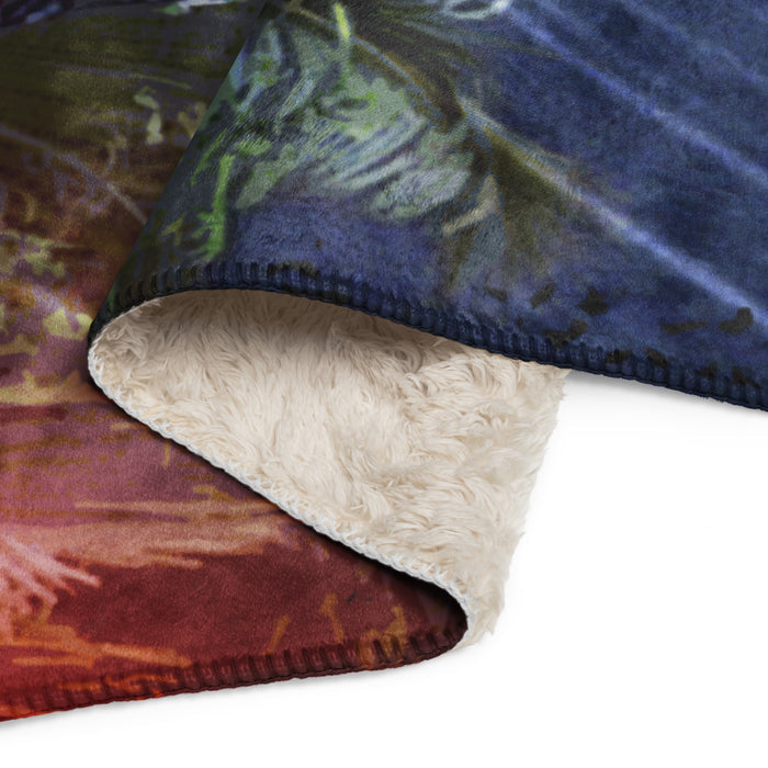 Front view of the Jurassic Park sherpa blanket spread out to display the full jungle graphic design