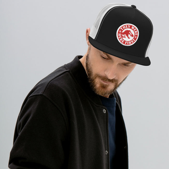 Front close-up view of the Jurassic Park trucker hat highlighting the embroidered graphic and structured crown