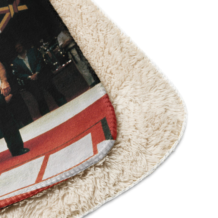 Close-up texture shot of the plush sherpa fleece backing on the blanket
