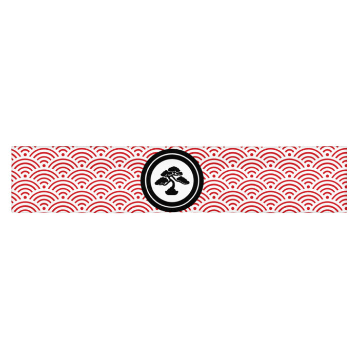 Karate Kid Legends athletic headband laid flat against a neutral background