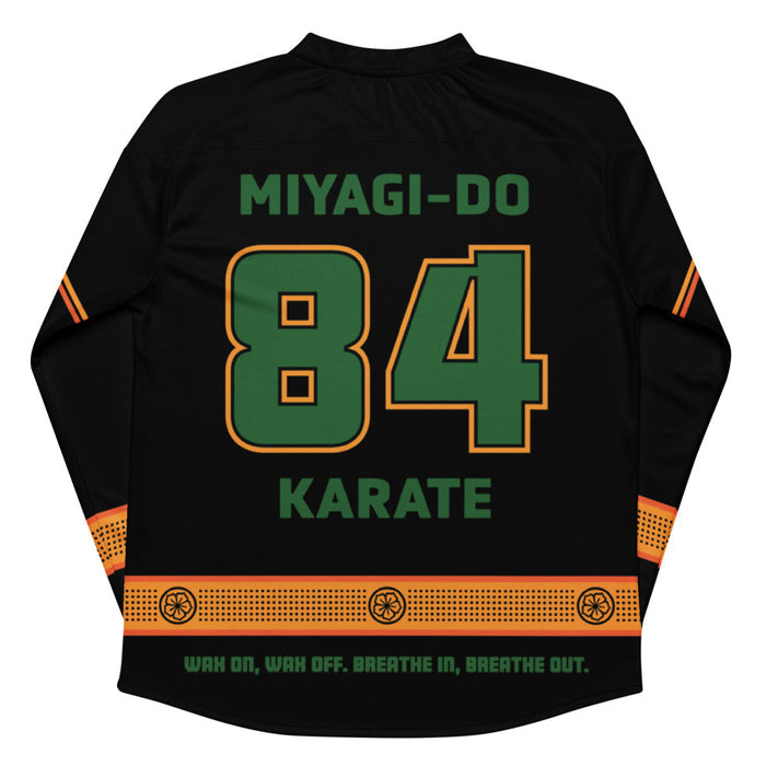 Close-up of the Miyagi-Do crest logo on the front chest of the Karate Kid hockey jersey