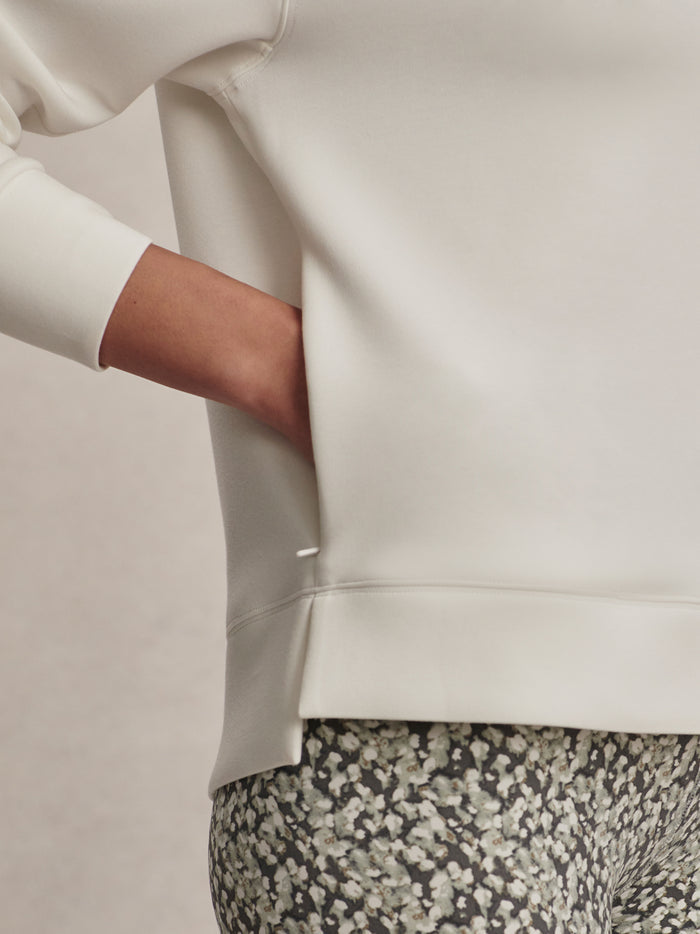 White|Varley KARO Half Zip Midlayer Snow White, front-facing product shot of a white midlayer with a half-zip neckline.
