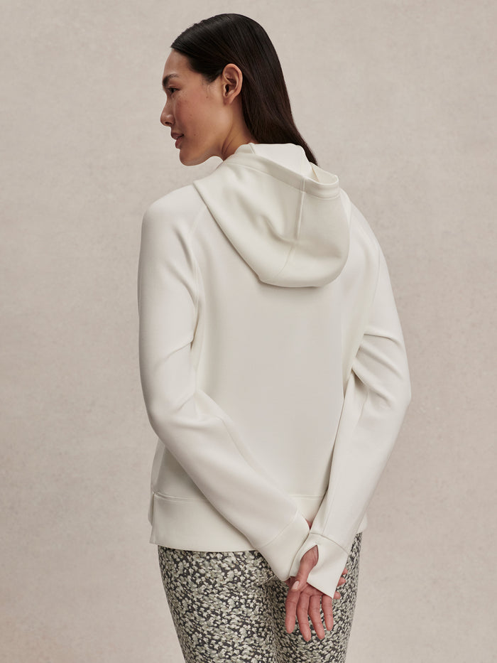 Snow White|VAR02685 KARO Half Zip Hooded Sweat in Snow White, a hooded sweatshirt with a half-zip and long sleeves.
