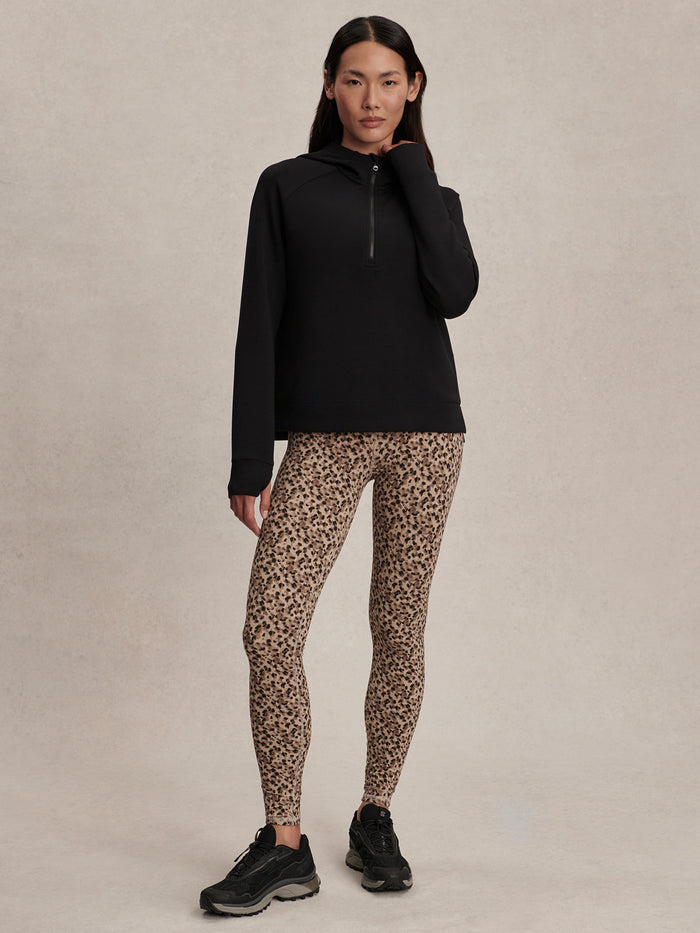 Black|Front view of the KARO Half Zip Midlayer Black, showcasing a high collar and subtle half-zip detail.