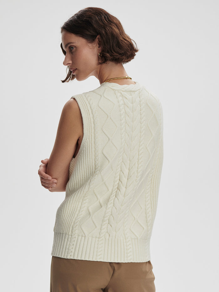 Snow White|Front-facing Kay Cable Knit Vest in Snow White, a sleeveless cable-knit vest.