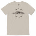 Sand t-shirt featuring a dark gray 'FIRST LITE' feather graphic and 'SINCE 2007' text.