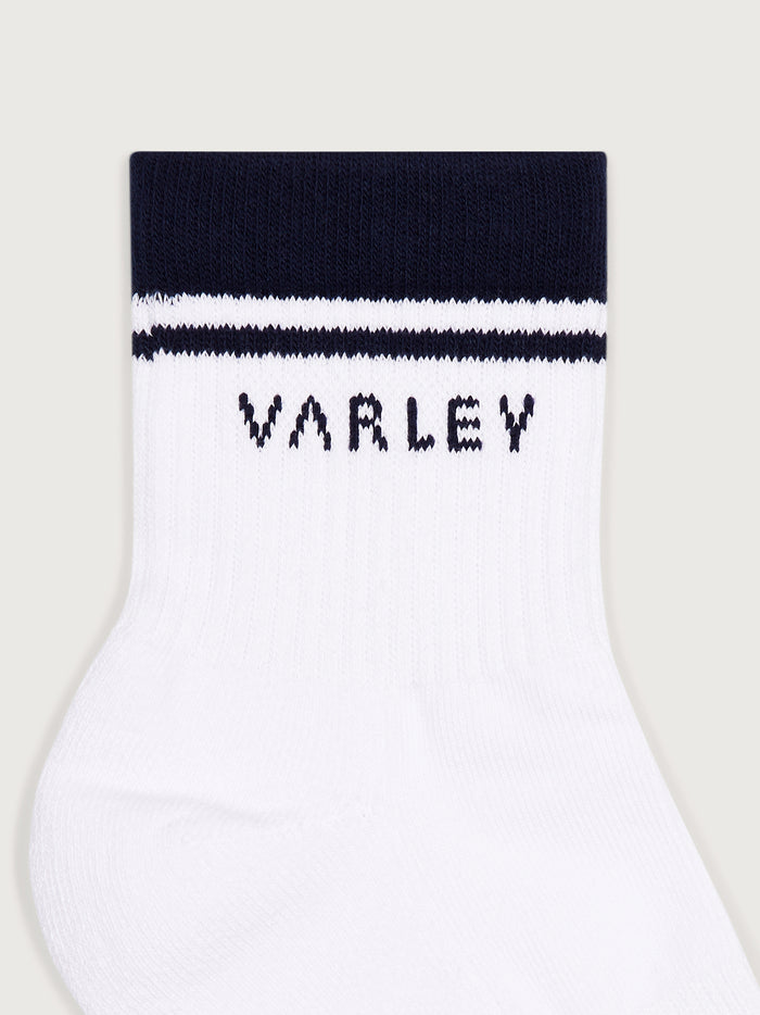 White/ Blue Nights|Lenni Half Crew Sock in White Blue Nights by Varley, close-up of knit fabric with color-block design and ribbed cuff.