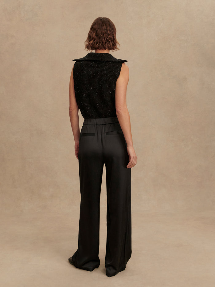 Black|Bryden 2.0 Wide Leg pants in Black with 29.5 inseam, front view product shot highlighting a relaxed wide-leg silhouette and tailored waistband.