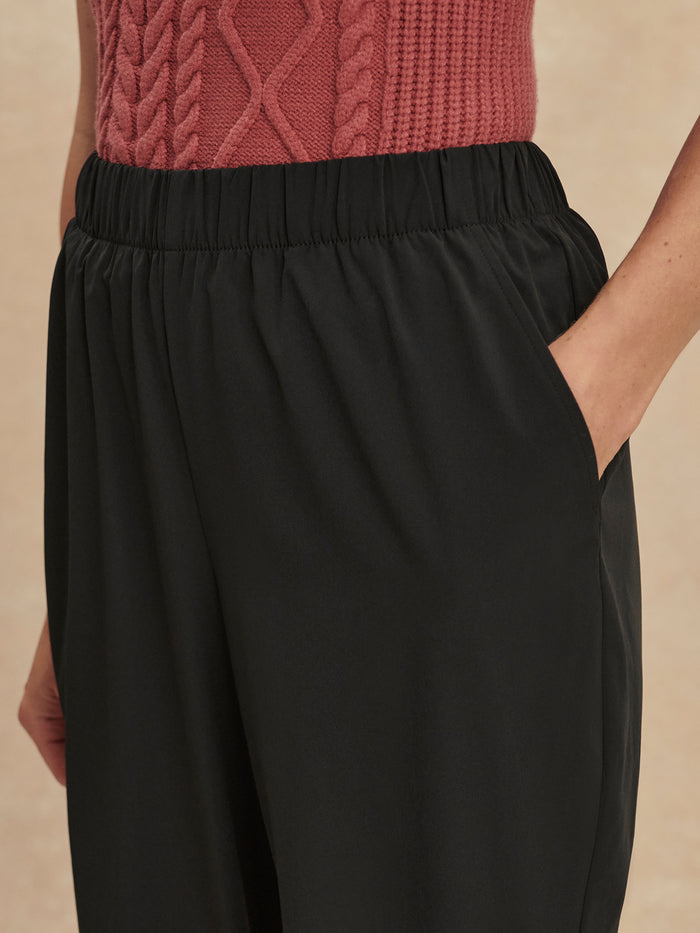 Black|ALANA Slim Tapered Cuff Pant 2.0 in Black, size 29, product image showing slim tapered leg and cuff at ankle.