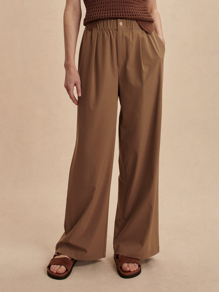 Taupe Stone|Kayson Wide Leg Pant 32 in taupe stone with wide leg silhouette and central front pleat, lightweight and versatile, snap and zip fastening.