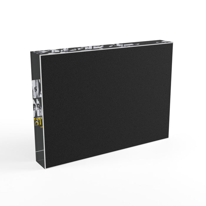 Detailed view of the sleek acrylic block resting on a desk setup as home and office decor