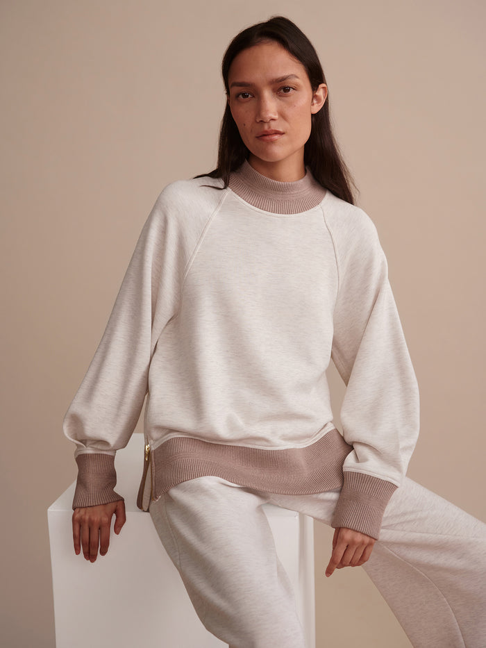 Ivory Marl/ Taupe Marl|Loxley Raglan Boyfriend Sweat in Ivory Marl and Taupe Marl, DoubleSoft® fabric, mock neck, dropped raglan sleeves, knitted trims and cuff pleats.