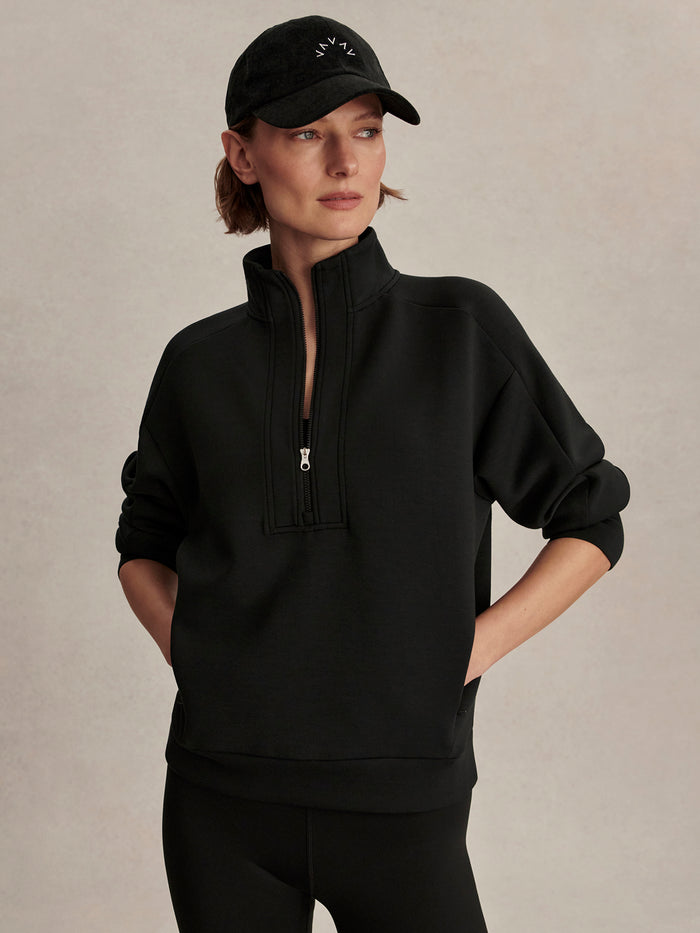 Black|Marissa Half-Zip Sweat in Black, lightweight spacer fabric mid-layer with a soft, smooth interior for cool, dry comfort during and after workouts.