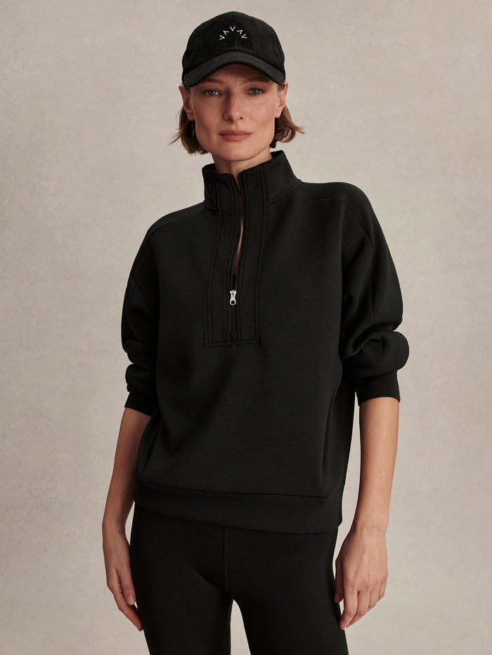 Black|Varley Marissa Half Zip Midlayer in Black, front view with a half-zip neckline, long sleeves and a sleek midlayer silhouette.