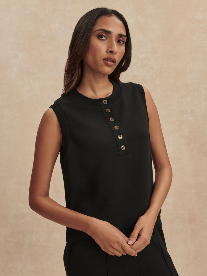 Black|Marla Button Placket Tank in Black, cropped DoubleSoft® fabric, decorative trim at neckline and armholes, button placket, side splits for movement.