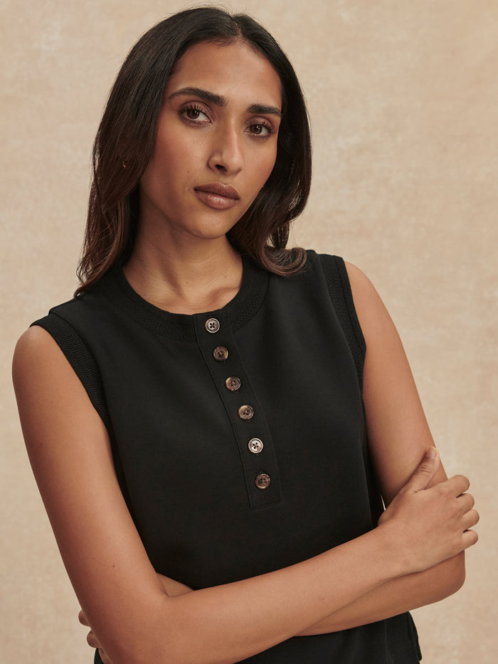 Black|Front view of the Marla Button Placket Tank Black, a sleeveless top with a button-front placket and smooth fabric.