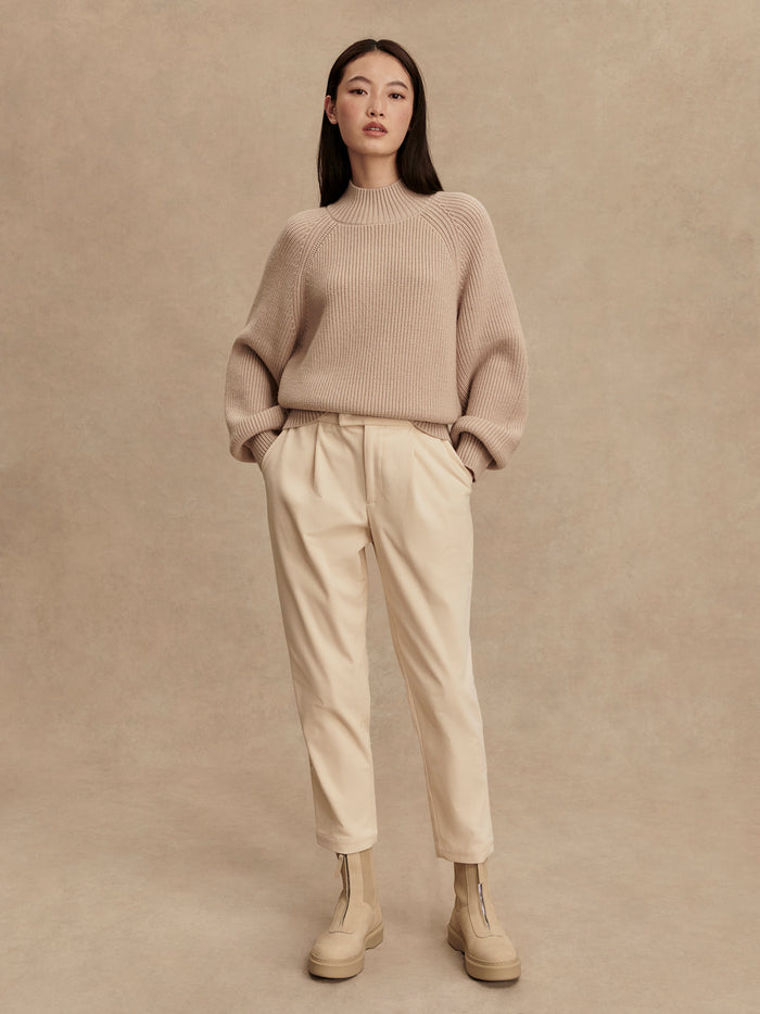 Cement|Front view of the Martina high neck rib knit sweater in Cement, a gray ribbed knit with a high neckline.