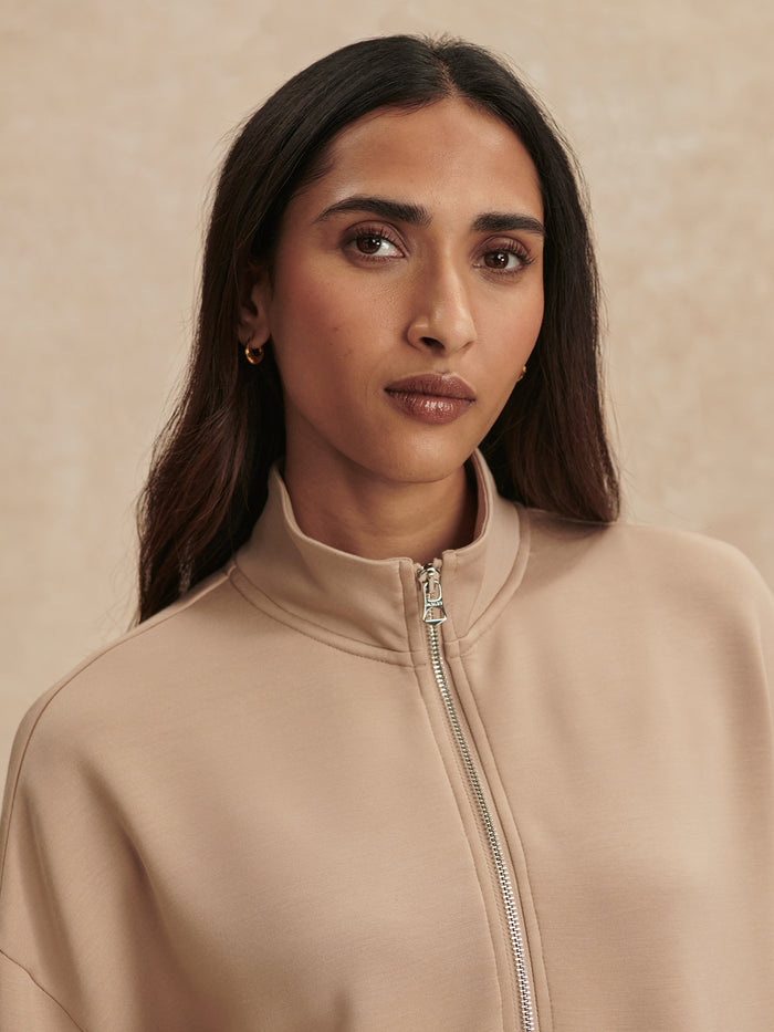 Light Taupe|MAVIS Mock Neck Sweat in light taupe, a relaxed-fit sweatshirt with a stand-up mock neck, ideal for layering in cool weather.