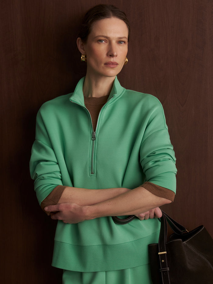 Green Spruce|Front view of Varley Mavis Mock Neck Sweat in Green Spruce, a sage-green long-sleeve sweatshirt with a mock neck and relaxed fit.
