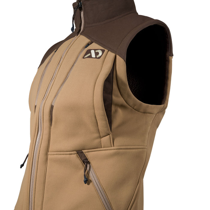 Two-tone tan and brown vest with a full-zip front, high collar, zippered chest pocket with a logo, and slanted hand pockets.