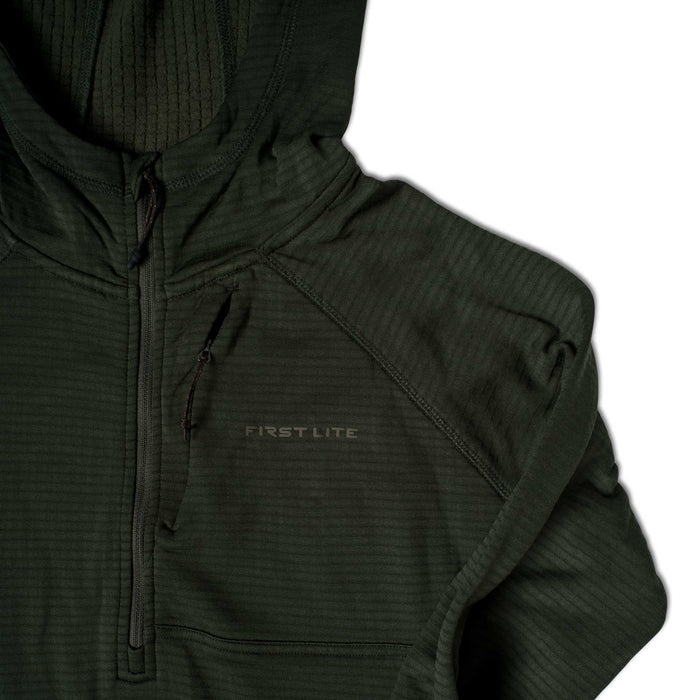 Dark green First Lite hooded quarter-zip top with textured fabric and a zippered chest pocket.