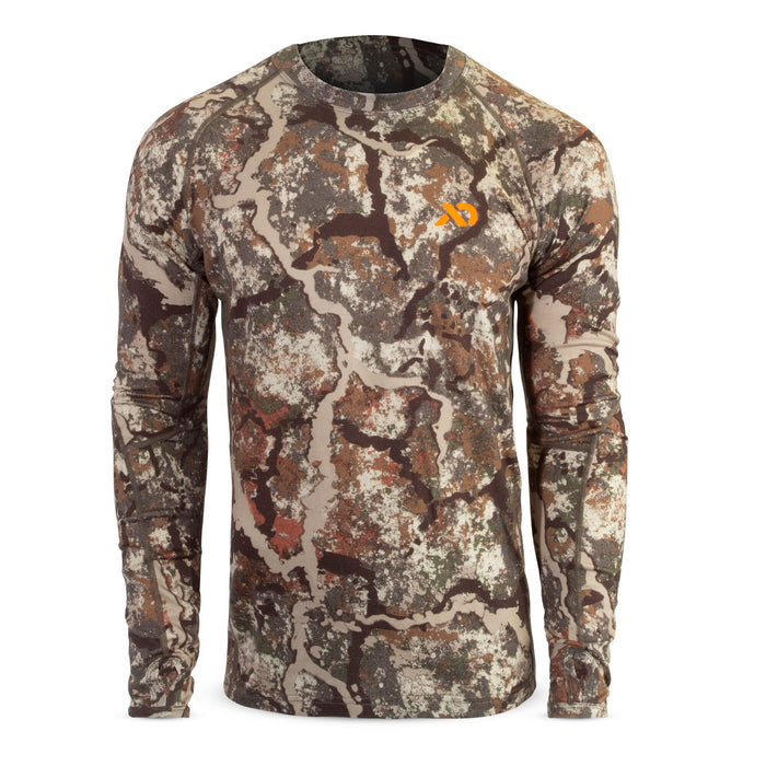 Camouflage long-sleeve shirt with an orange chest logo, flatlock seams, and thumbholes.