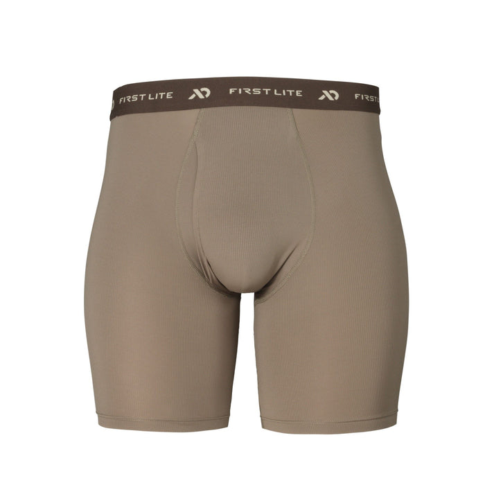 Tan ribbed performance boxer briefs with a dark brown elastic "FIRST LITE" logo waistband and a contoured pouch.