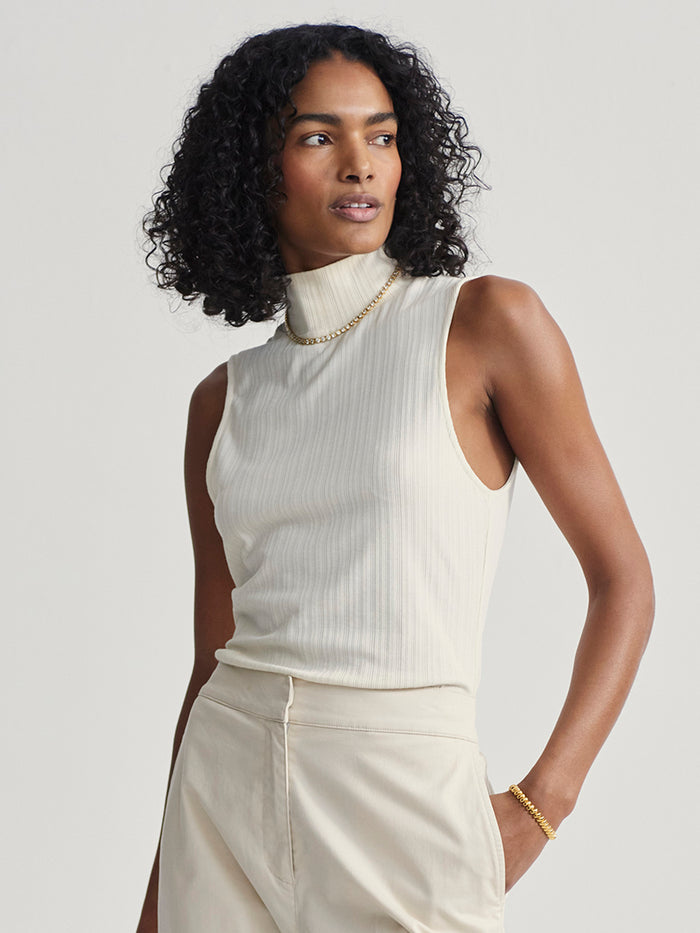 Birch|Caley 2.0 Fitted Tank in Birch, a fitted rib tank with a modern mock neck and a straight hem, designed as a base layer.