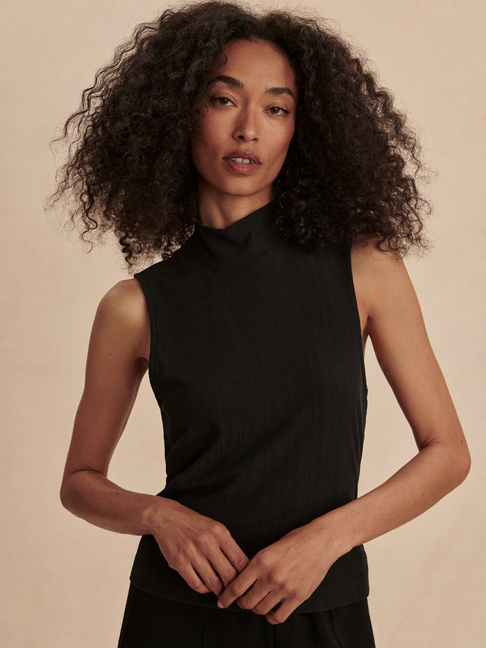 Black|Front-facing view of the Caley Fitted Tank 2.0 in Black, a sleeveless, form-fitting top with smooth jersey fabric.