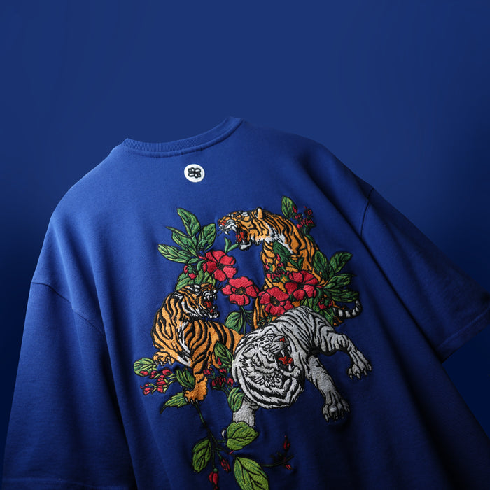 Navy premium oversized streetwear tee with dense embroidery artwork