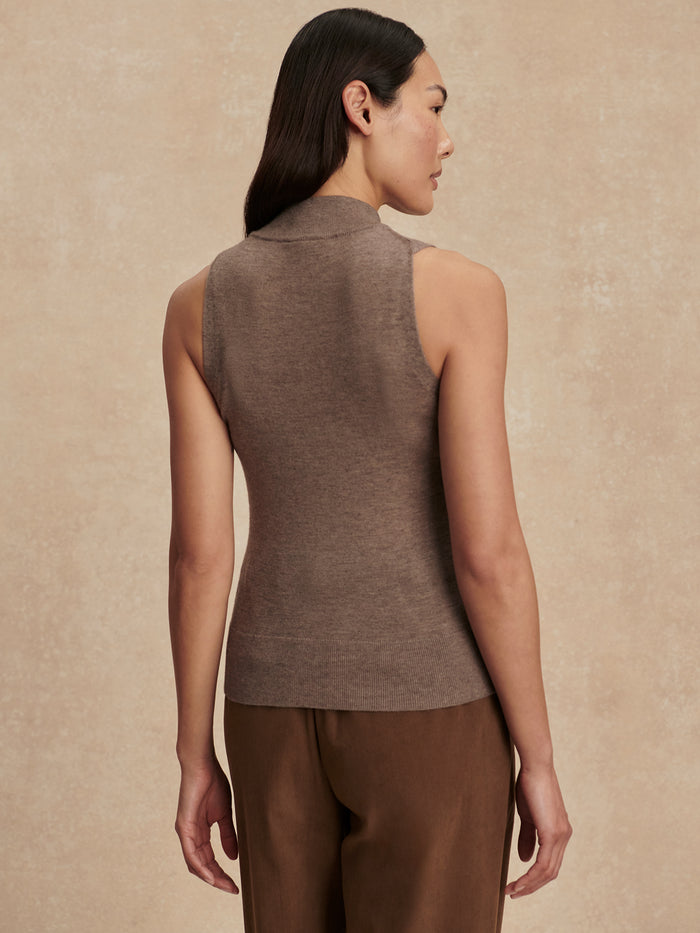 Cinder Marl|Model wearing Neilsen Sleeveless Knit Top in Cinder Marl, heather gray, front view, relaxed fit.
