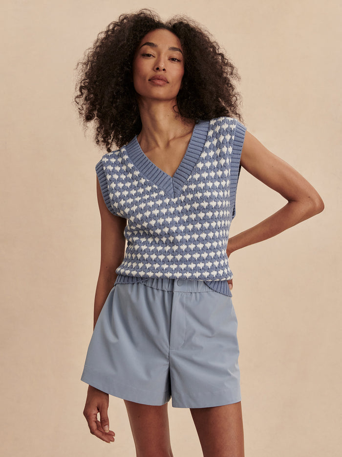 Rain Blue|Nila Mid Rise Short 3.5 in Rain Blue, Soft Stretch fabric with elastic waistband, snap-fastening and front zip, angled pockets, shaped hem.