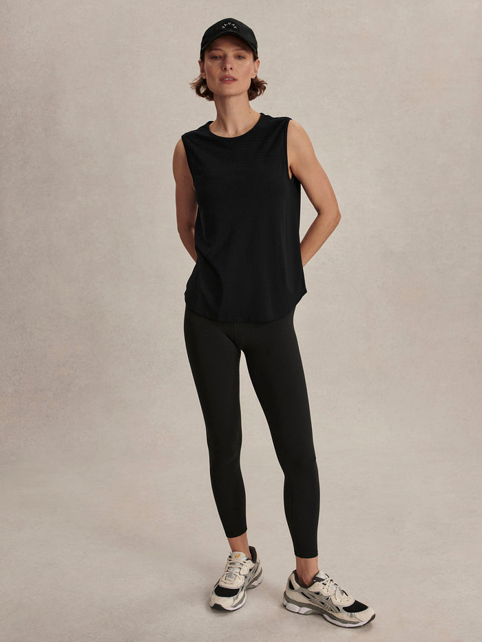 Black|Front view of Nolan Seamless Longline Tank in black, sleeveless with seamless construction and extended length for a sleek silhouette.