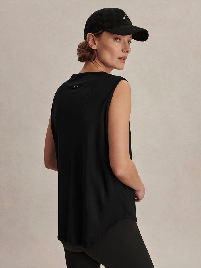 Black|Varley Nolan Seamless Longline Tank in Black, sleeveless top with a relaxed longline silhouette and seamless construction.