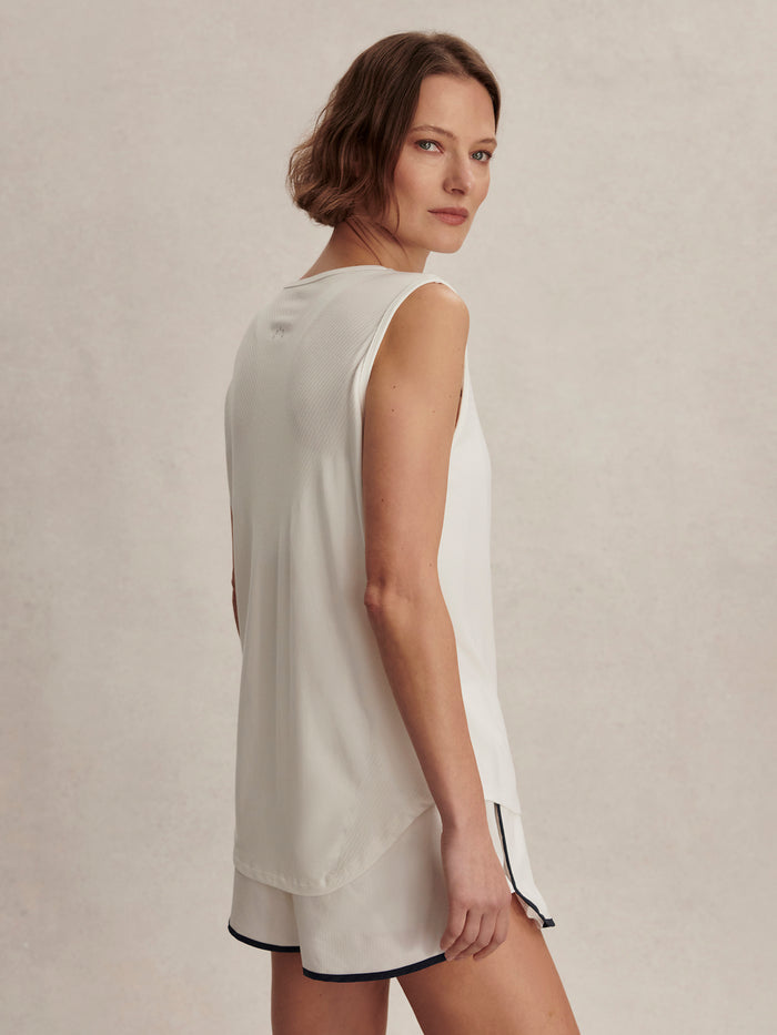 White|Nolan Seamless Longline Tank White, front view of a sleeveless seamless knit tank top in bright white fabric.