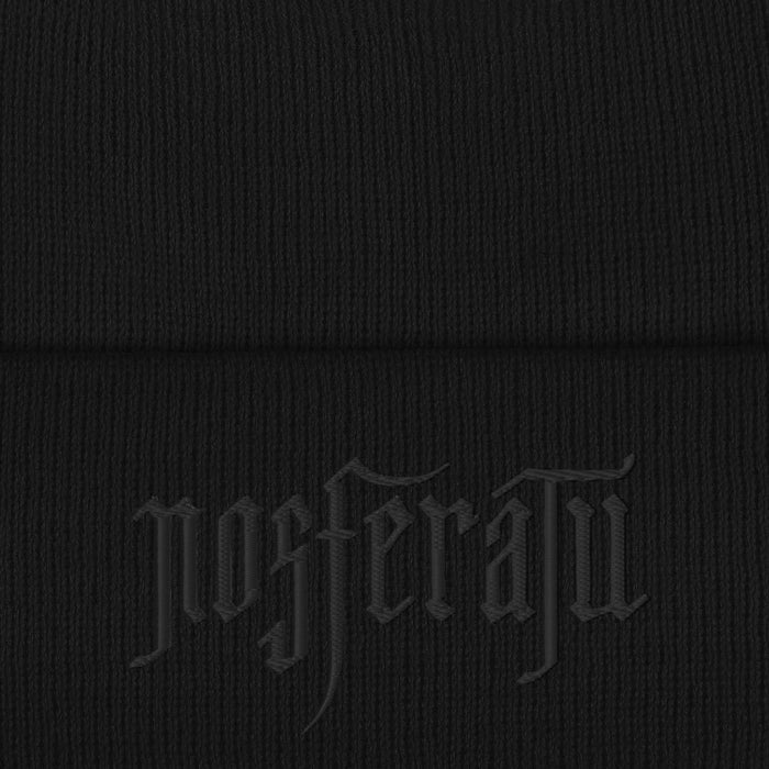 Close-up view of the white embroidered Nosferatu text logo on the beanie fabric