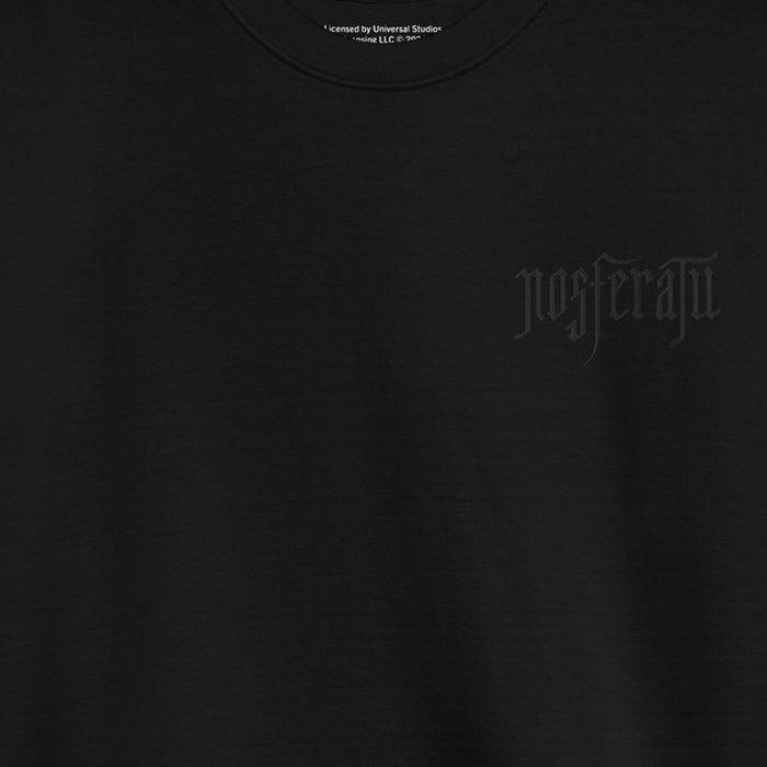 Close-up of the Nosferatu logo embroidery and soft fleece fabric texture on the sweatshirt