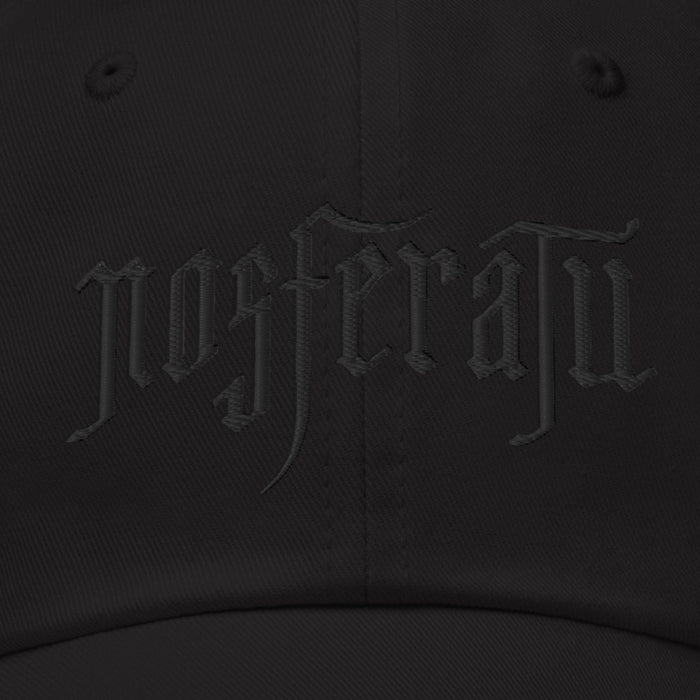 Close-up detail of the adjustable strap and antique metal buckle on the back of the Nosferatu embroidered dad hat