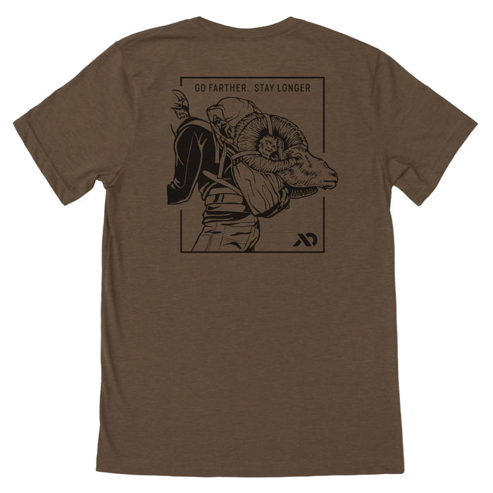 Heather brown t-shirt with a black graphic on the back: a framed illustration of a person carrying a bighorn ram, topped by the text 'GO FARTHER. STAY LONGER'.