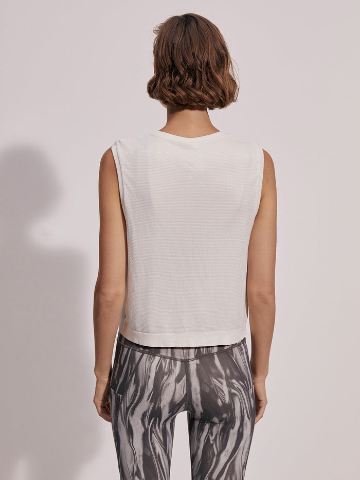 Snow White|Front-facing Varley Seamless Crop Tank in Snow White, a lightweight cropped tank top with seamless construction.