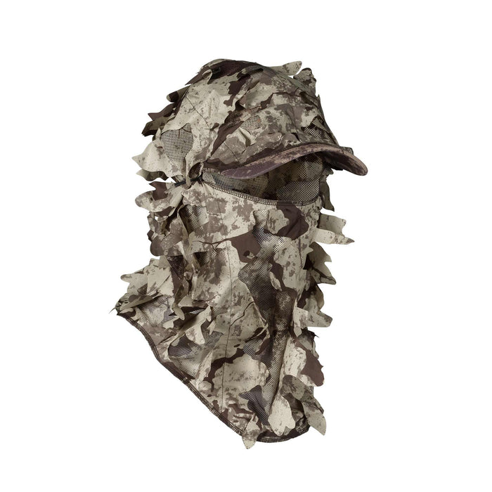 Leafy camouflage balaclava in tan and brown tones with an integrated cap and mesh face covering.