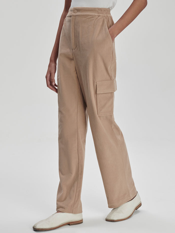 Stucco|Sabina Straight Leg Pant 31.5 in Stucco corduroy with cargo and back patch pockets, elasticated side waistband inserts, generous fit; size down.