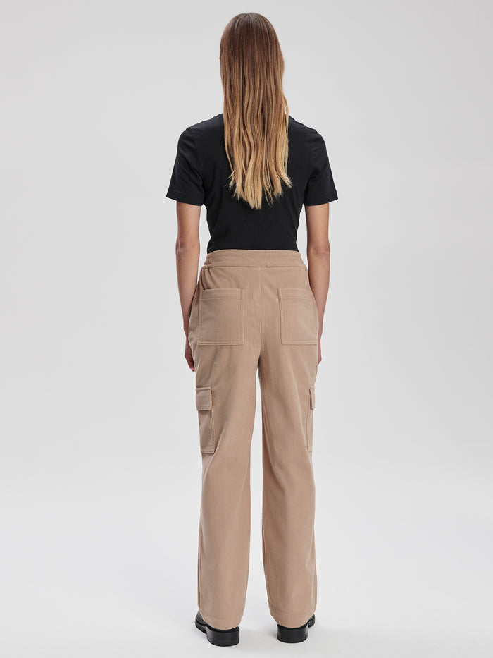Stucco|Sabina Straight Leg 29 Stucco jeans, front view showing classic five-pocket styling and a straight-leg fit.