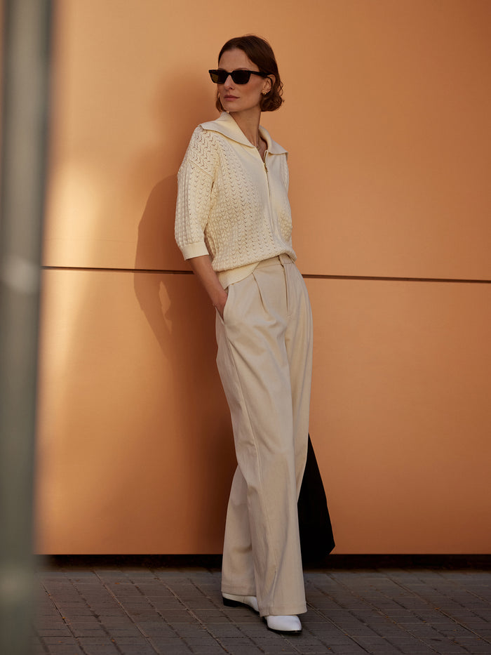 Birch|Rocio Wide Leg Pant 32 in NeedleCord Birch with fitted waist, extra wide leg and pleats; side pockets, back welt pockets, elastic waistband, snap-front fly.