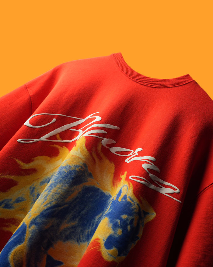 Red Puyma T-Shirt with colorful graphic design and 'Bluorng' branding on an orange background