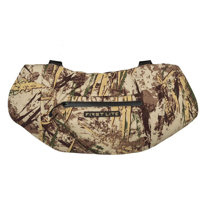 Brown and tan camouflage hand muff with a central zippered pocket displaying the "FIRST LITE" logo.