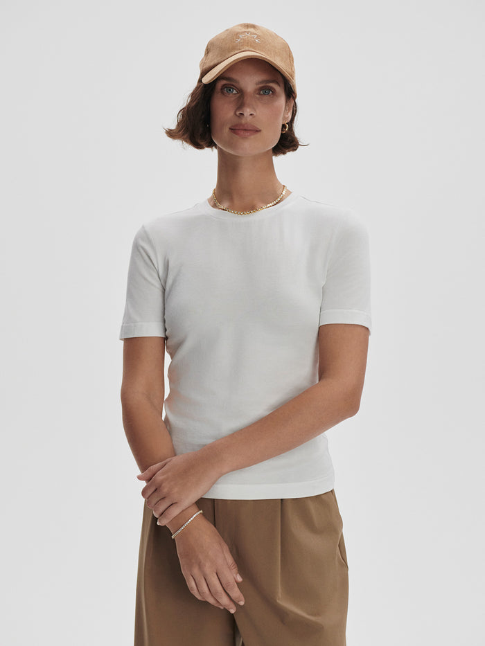 White|Front view of Regina Fitted Tee in White, a form-fitting short-sleeve crew-neck top.